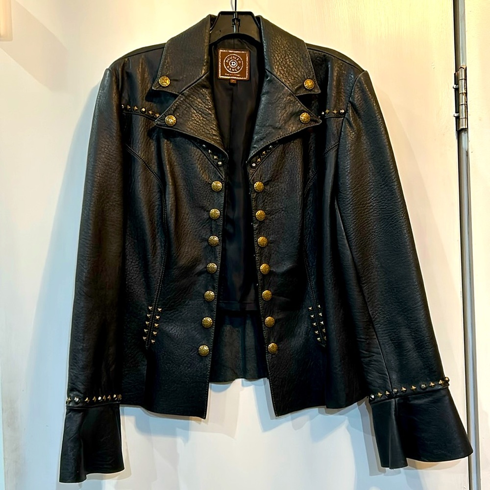 Double D Ranchwear with studs. Lightly worn. Genuine lamb skin  size M